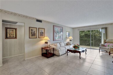 Oversized living areas opens to big screened patio