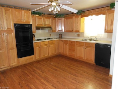 Kitchen -- 14 x 12.5 -- features built-in range, o