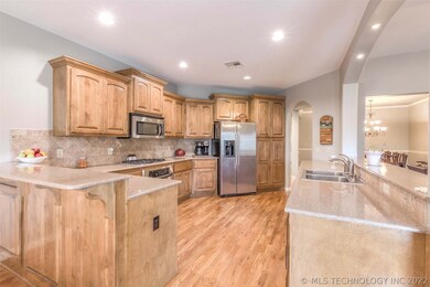 Pretty granite kitchen, serving bar over sink and