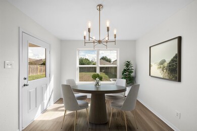 Welcoming dining nook with lots of natural light.  (Virtually staged.)