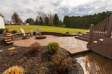 VIEW OF PAVER PATIO WITH FIRE PIT WITH KNEE WALL, 