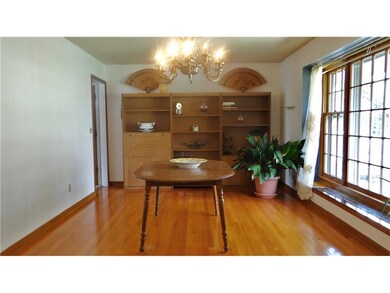 Enjoy wood flooring & easy access to the kitchen.