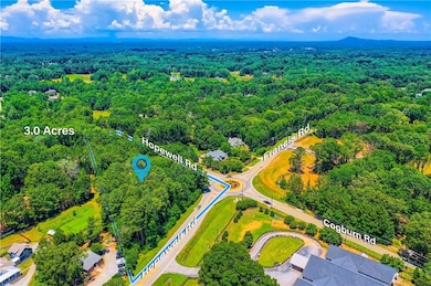 View of property location with a forest