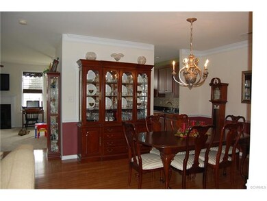 FORMAL DINING ROOM WITH HARDWOOD FLOORS
