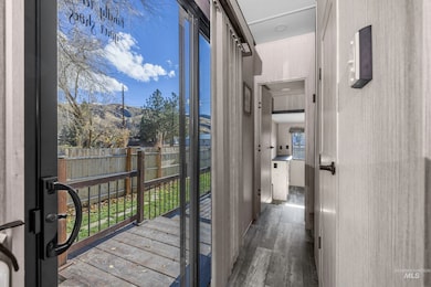 Hall with dark wood-style floors
