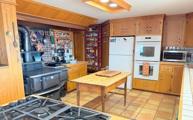 Country kitchen with wood-fired cooking stove