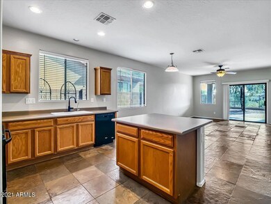 Kitchen overlooks Family Room