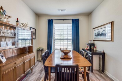 Dining area featuring luxury vinyl plank flooring