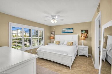 Bedroom featuring ceiling fan and baseboards