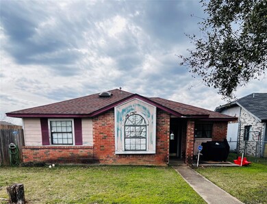Ranch-style home with a front yard