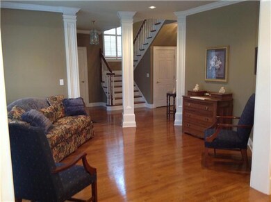 14x12..Living Room..view from Dining room..nice hardwood floors and windows to view the front lawn. Great plantation shutters also