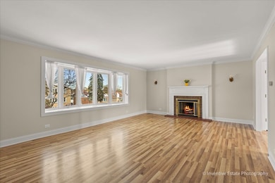 Enter Your Spacious Living Room with a Gas Log Fir