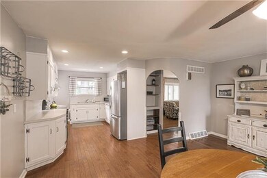 The open kitchen and dining area provide plenty of