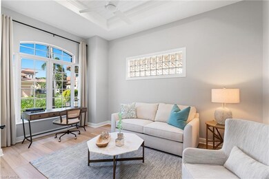 Den with ceiling fan, shiplap board tray ceiling, 