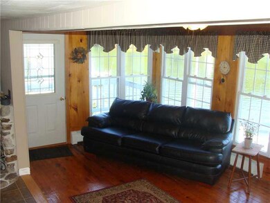 Living Room. Lots of windows for...