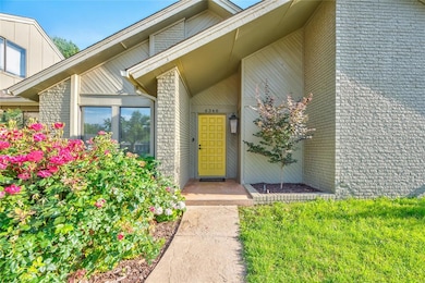 Property entrance with brick siding