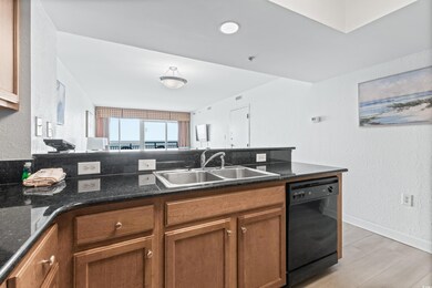 Kitchen with dishwasher, backsplash, sink, light h