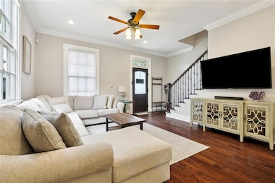 Spacious Living Room with Floor to Ceiling Front W