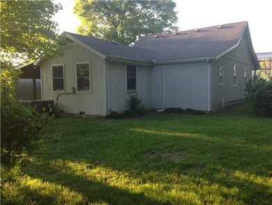 Back view of this spacious home on a 1 Acre Lot