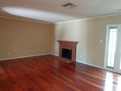 Living Room with Wood Floors and Fireplace