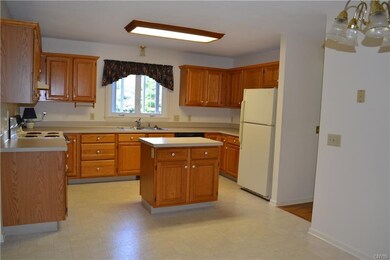 The kitchen layout provides generous counter space