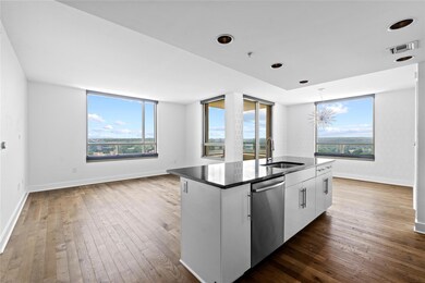 Kitchen featuring a sink, stainless steel dishwas