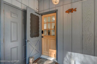Covered entry w/ storage closet