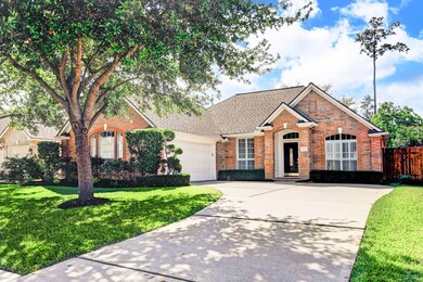 Beautiful trees, mature, manicured landscaping enhances curb appeal.