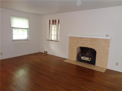 Large pieces will fit. Hardwood floors compliment 