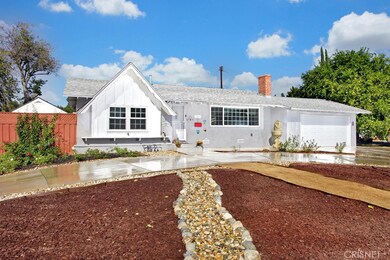 This beautiful home with abundant upgrades is located on a quiet tree-lined cul-de-sac and corner lot in one of Canoga Park’s most sought-after neighborhoods. The newly refreshed easy-care landscaping with its colorful flowerbeds and covered entryway