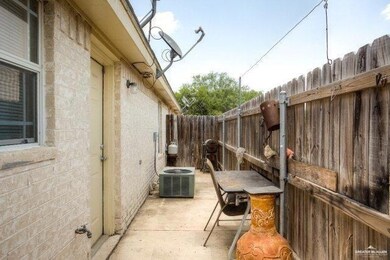 View of patio with central air condition unit and a fenced backyard