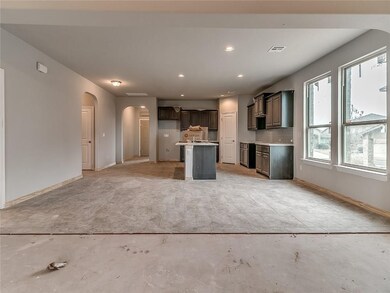 Kitchen  A large 8-foot island greets you as you e