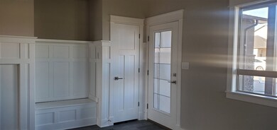 Upon entering, a custom beadboard wall includes a 