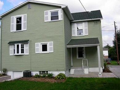 Exterior Back. Newer windows, freshly painted sidi