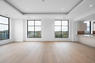 The open layout between the living area and the ki
