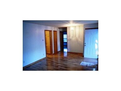 Spacious living room, beautiful floors!
