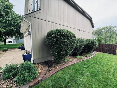 View of property exterior with a yard
