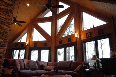 The great room features a cathedral ceiling and a 