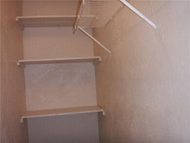 View of the large walkin closet in the master bedr