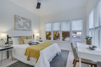 Carpeted bedroom featuring baseboards and ceiling