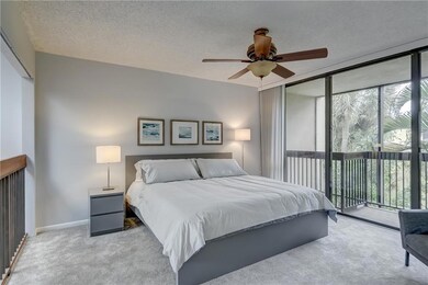 Spacious Master Bedroom with floor-to-ceiling wind