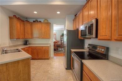 Kitchen with plenty of work space and cabinets.