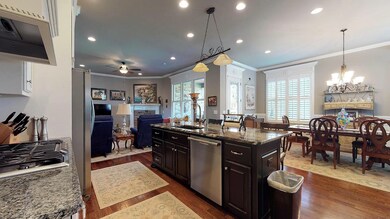The kitchen includes gas cooktop and large pantry.
