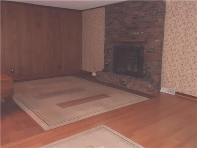 Living Room. With hardwood flooring.