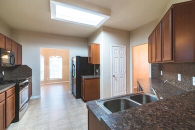 The kitchen is large and bright