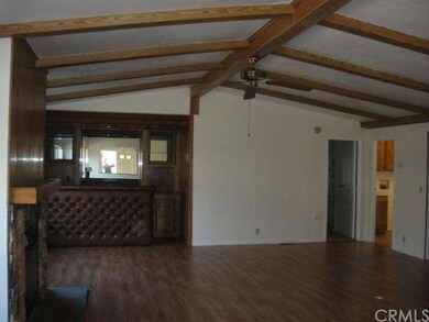 Living room, fireplace & bar.