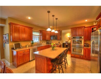 Kitchen. Cherry custom kitchen with stainless appl