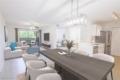 Dining area featuring ceiling fan, visible vents,
