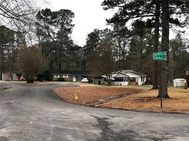 Quiet street facing Crape Myrtle Circle.