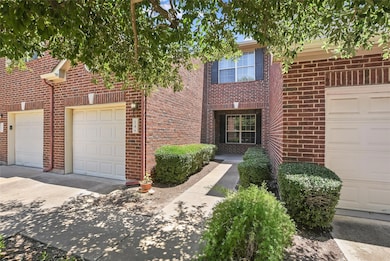 View of front of property featuring brick siding 
